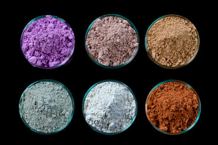 Ancient minerals - Clay of several colorsclay powder and mud mask for spa, beauty concept crop on black backgroundの写真素材