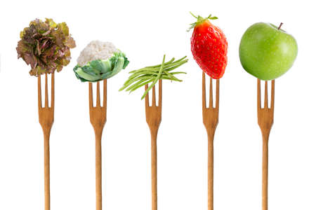 healthy eating: five wooden fork with fruit and vegetable, on white backgroundの写真素材