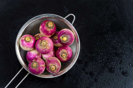 Fresh garden vegetables: Fresh vegetables in rustic colander on wooden table