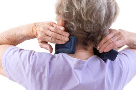 Close-up woman with bandage, brace on her neckwearing medical bandの写真素材