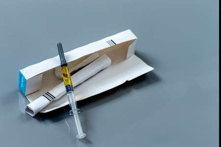 box or package of Flu prevention vaccine or protection programe on grey background
