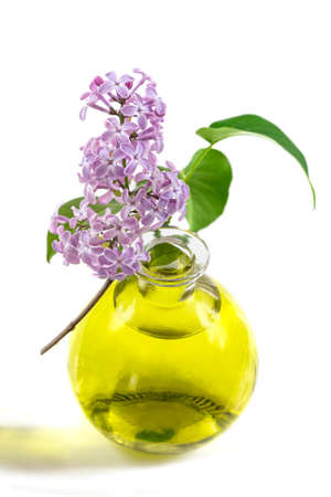 Relaxing essential oil, fresh flowers, relaxation. Isolated on white background.の写真素材