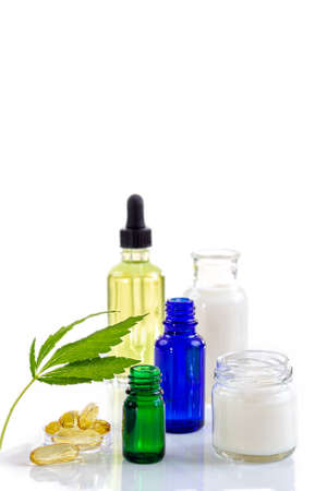 Cosmetic hemp concept Cannabis hemp bodycare procucts with marijuana leaf on whtebackgroundの写真素材