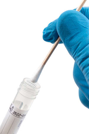 swab collection kit, test tube for taking OP NP patient specimen sample, testing carried out, patient receiving testの写真素材