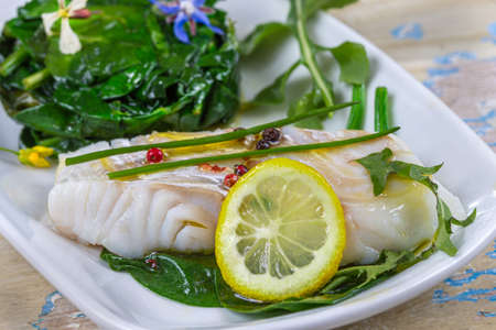 Cod with spinach sauce spinach cream fresh cream