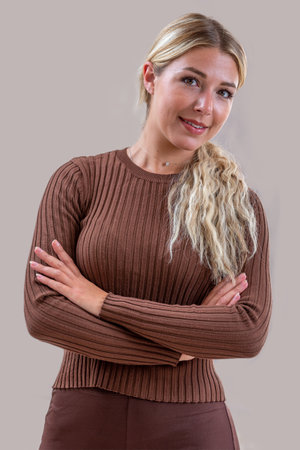 Portrait of a young blonde woman with ponytail.の写真素材