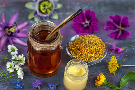 A variety of bee products. Honey, pollen, propolis, Apitherapy. Healthy products made by bees.の写真素材