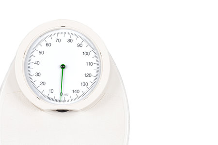 Health - scale on a white background, weight control