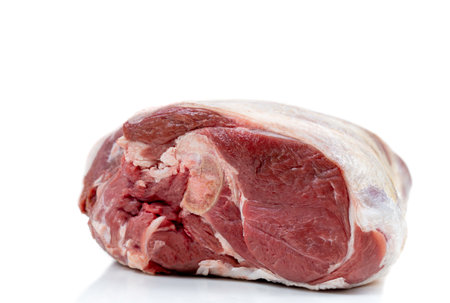 Raw lamb leg, isolated on whiteの写真素材