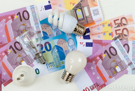 Energy costs and electricity prices. Electricity consumption concept. Euro Banknotesの写真素材