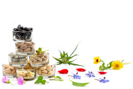 Food supplement oil filled fish oil, omega 3, omega 6, omega 9, vitamin A, vitamin D, vitamin E, flaxseed oil. on white backgroundの写真素材