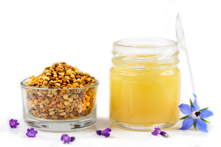 A variety of bee products. Honey, pollen, royal jelly, Apitherapy. Healthy products made by bees.の写真素材