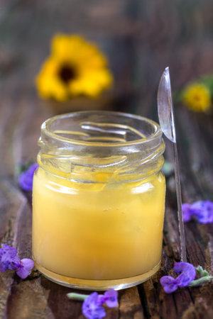 A variety of bee products. Honey, pollen, royal jelly, propolis, Apitherapy. Healthy products made by bees.の写真素材