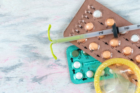 Pregnancy test and birth control pills , contraception and protection concept, health and medicine.の写真素材