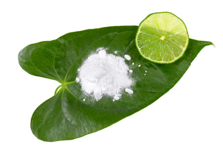 Baking soda, vinegar and cut lemons on white wooden table, flat lay. Sの写真素材