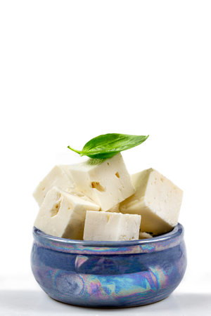 Feta cheese isolated on white background. With clipping path and full depth of field. Top view. Flat layの写真素材