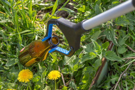 Device picks up litter among wildflowers in spring