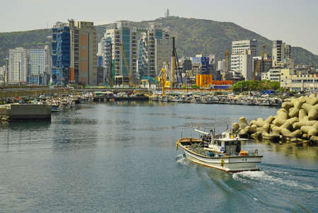 BUSAN KOREA APR-17-2019 a small port located near Gwangalli Beach.のeditorial素材