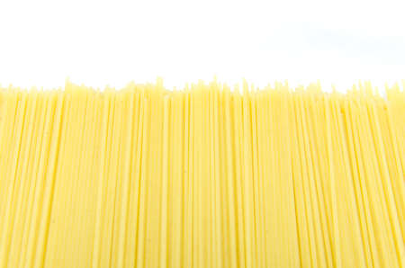 Pasta (spaghetti) whole grain on white backgroundの写真素材