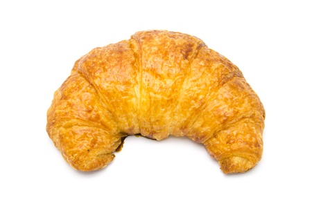 Fresh and tasty croissant over white backgroundの写真素材