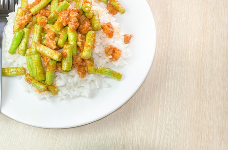 Stir fried pork and curry paste wite riceの写真素材
