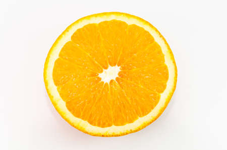 slice of orange isolated on white backgroundの写真素材