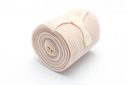 Elastic ACE compression bandage warp unwrapped, isolatedの写真素材