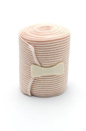 Elastic ACE compression bandage warp unwrapped, isolatedの写真素材
