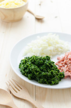 Ingredient of baked spinach with cheeseの写真素材