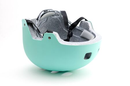 Mint helmet isolated on whiteの写真素材