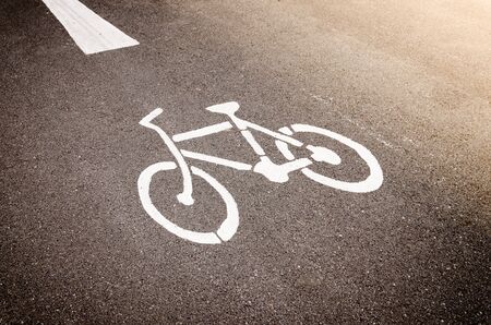 Bike Lane Symbol, Bicycle white sign on road.の写真素材