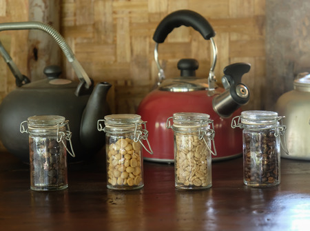 Many kind of coffee beans in glass jar