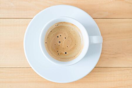 Cup of hot coffe on wood tableの写真素材
