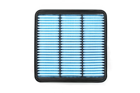 Flat engine air filter in a plastic case on a white background