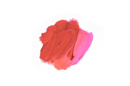 Smudged lipsticks isolated on white backgroundの写真素材