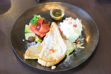 French toast pieces with fruitsの写真素材