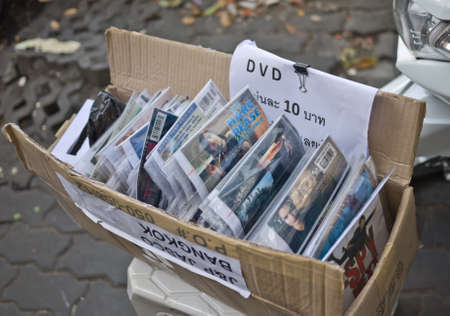 Bangkok, Thailand, January 18, 2013 - Illegal movie selling cheap on the streetのeditorial素材