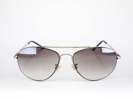 Aviator style sunglasses for men isolated on whiteの写真素材