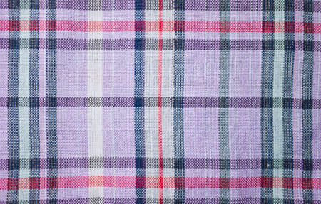 Fabric texture and cross pattern in purple, red and black color