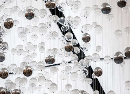 many balloons decorate on the ceiling in one of the special occasion party