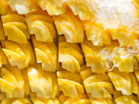Lot of fresh prepared pineapple able to use as background