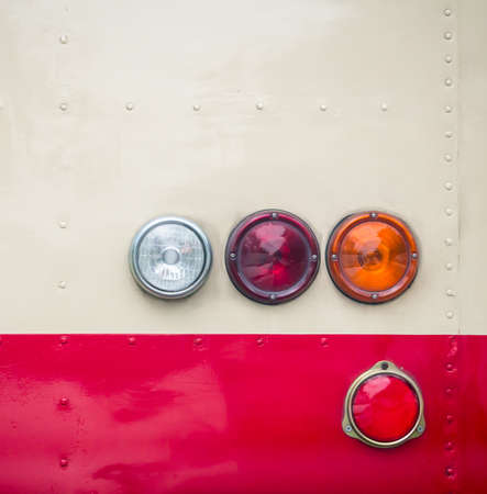 Rear view of the old bus showing four light signalsの写真素材