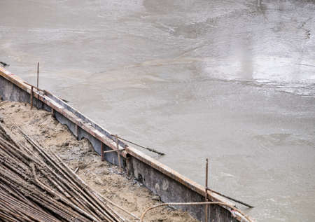 Wet concrete slab under constructionの写真素材