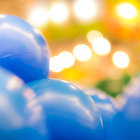Abstract of blue balls over the colorful orange backgroundの写真素材