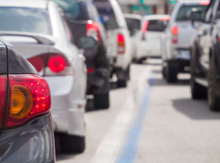 Car queue in the bad traffic road. Selective focus. Car queue in the bad traffic road. Selective focus.