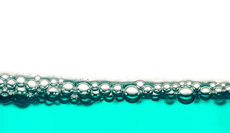 Macro of bubbles on the clear green water able to use as background