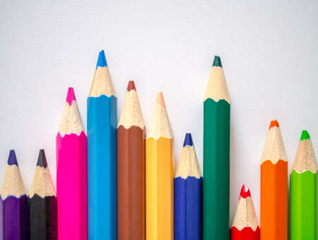 Colored pencil isolated on grey textured art paperの写真素材