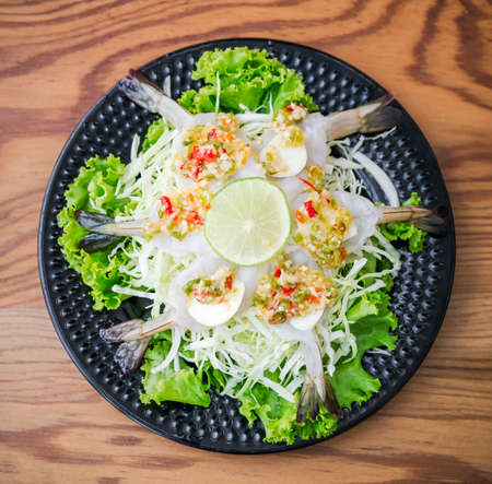 Raw shrimp in fish sauce, the Thai spicy appetizer, shot from top viewの写真素材