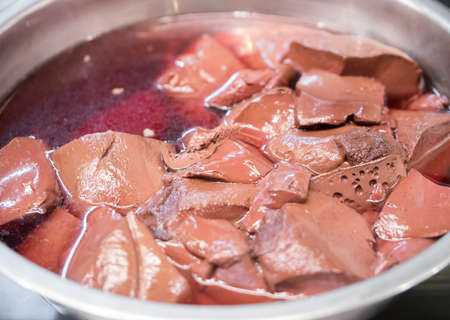 Closeup of pork blood in clear soup.の写真素材