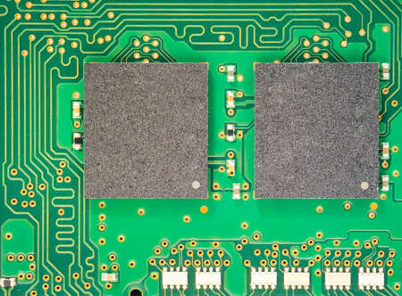 Macro shot of electronic board with a pair of microchip